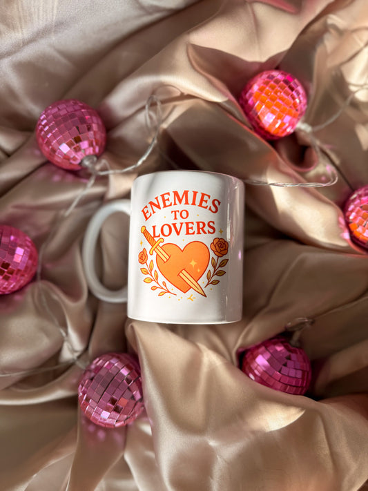 Enemies to Lovers | Trope Mug